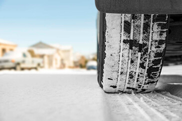 Vehicle tire in snow