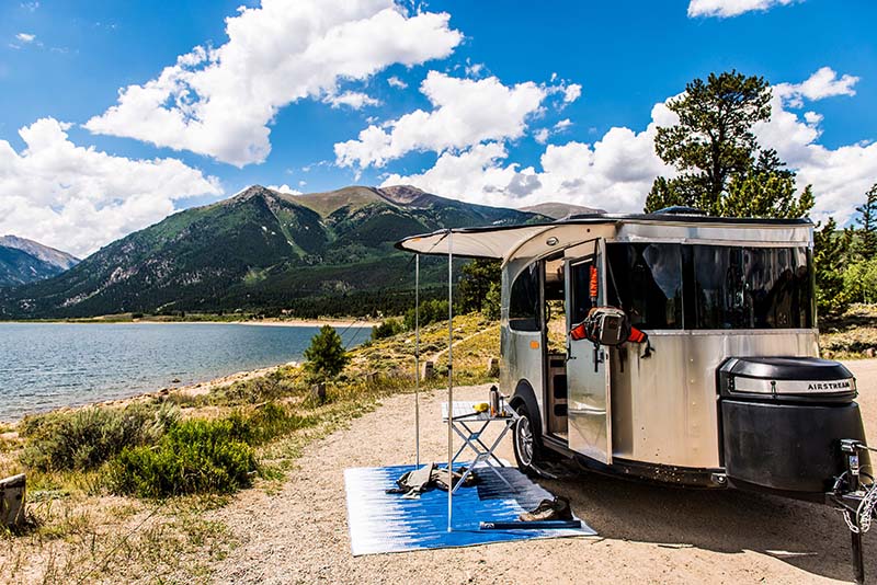 Airstream RV Basecamp Travel Trailer by lake