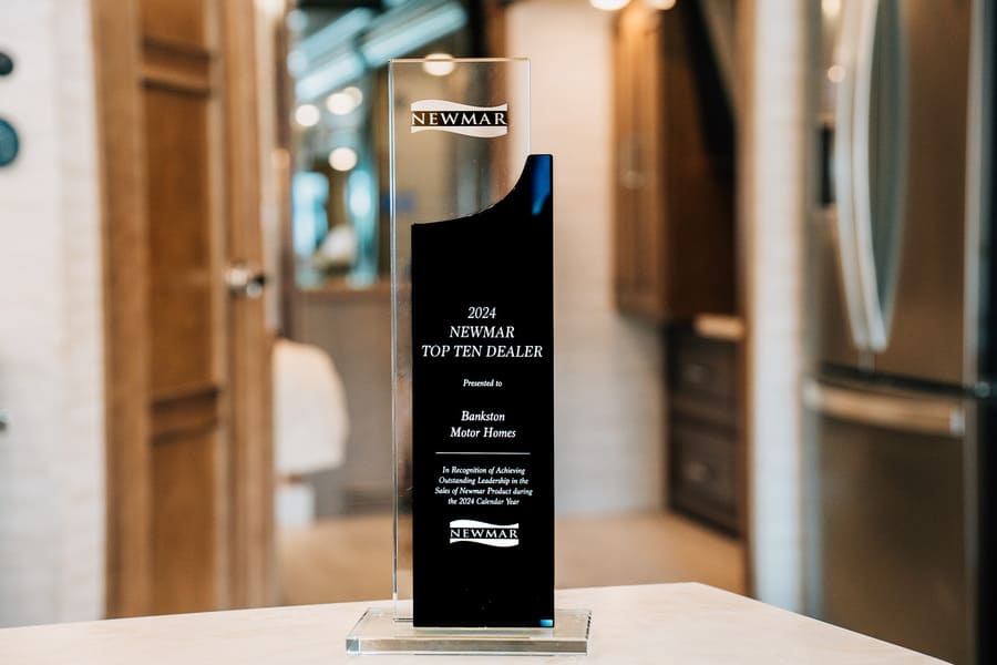 Top 10 Newmar Dealer 2024 award presented to Bankston Motor Homes