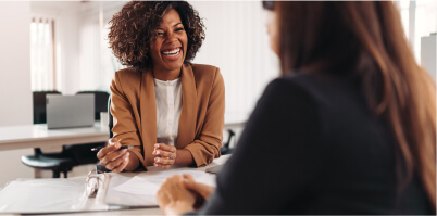 Women reviewing paperwork