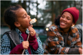 Kids around campfire