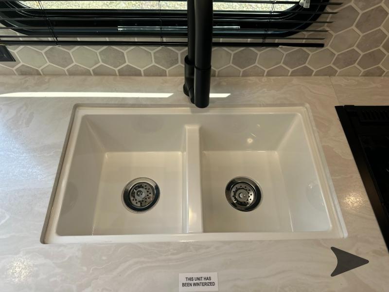 Looking for ideas for an insert to cover the sink in our Jayco 212QB for  more counter space.Is there a ready made piece or do we need to have  something made? 