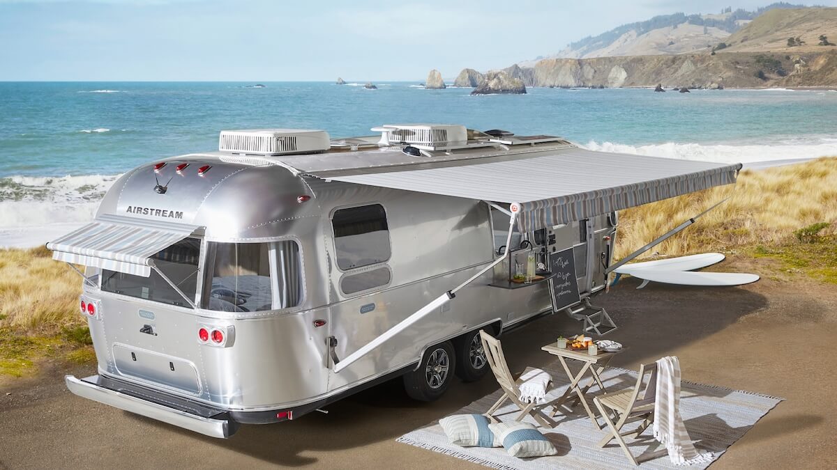 An Airstream trailer parked overlooking the ocean