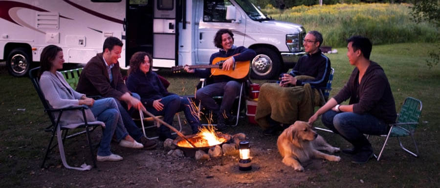 People camping around a fire