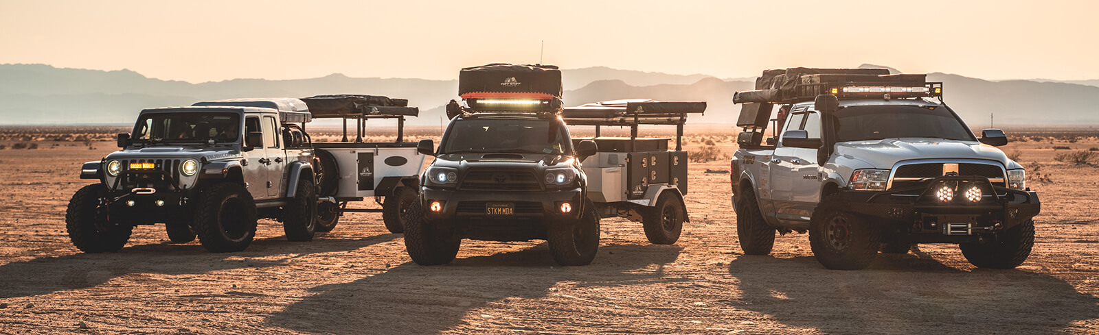 Three Tribe Overland Trailers in the desert