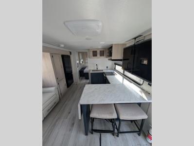 Front-facing interior of 2025 Prime Time RV Avenger 25MKB