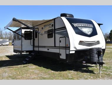 Left Front Corner - Awning and Slide-outs Extended