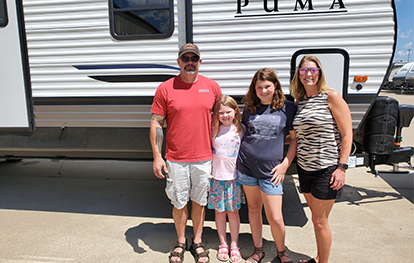 This family just bought a new Puma Travel Trailer
