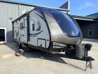Aerodynamic rounded front with tinted glass window of used 2018 Keystone RV Premier RV Ultra Lite 19FBPR