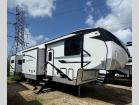 Side view of used 2023 Coachmen Chaparral 375BAF fifth wheel with slides extended