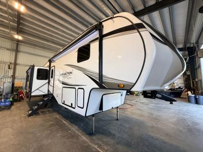 Used 2024 Grand Design Reflection 337RLS, sleeps 4, has a painted fiberglass front cap