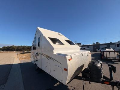 Used 2014 Forest River RV Flagstaff Hard Side T19HW folding pop up camper has a quick set up with power roof lift system