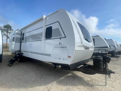 New 2025 Coachmen Freedom Express Ultra Lite 320BHDS travel trailer with 20' power awning