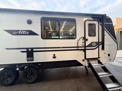 Sturdy steps leading to front kitchen of new 2026 East to West Alta 2775KFK travel trailer