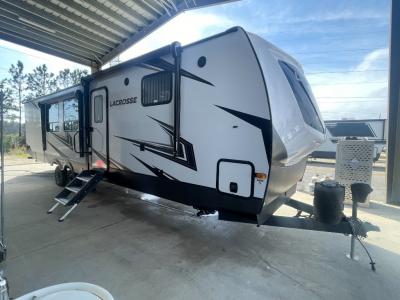 New 2025 Prime Time LaCrosse 3510DB travel trailer with two 10' power awnings