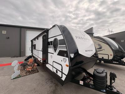 New 2026 Keystone Passport Super Lite 2450RK with 19' awning, built for easy towing by SUVs and light duty trucks