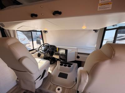 Comfortable captain seats in cab, touchscreen control consul, 3 cup holders in new 2026 Thor Motor Coach Luminate MM30