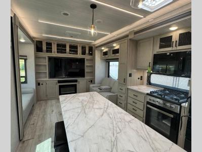 Opposing living area slides add to the spacious feel of the new 2026 East to West Alta 3250KXT RV