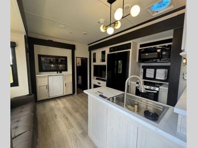 Spacious living area in new 2026 Forest River Vengeance Rogue Armored 341GS11 luxury toy hauler