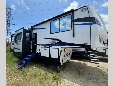 New 2026 Forest River Vengeance Rogue Armored 341GS11 luxury toy hauler with rear ramp door and garage access exterior side view