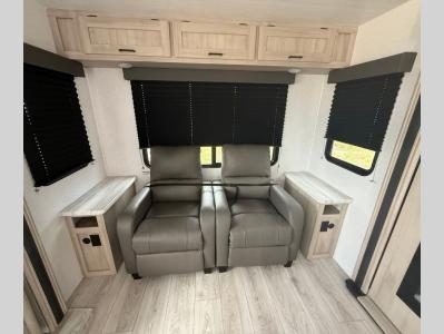 Theater seats and storage in living area of new 2026 East to West 
Della Terra 272RL RV