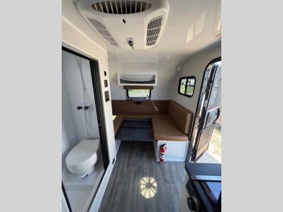 Wet bath and dinette that folds to a bed in new 2026 Modern Buggy Big Buggy BB16 RV