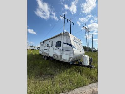 Used 2013 Crossroads Zinger ZT25RB travel trailer with awning