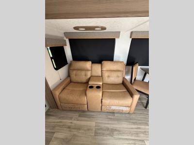 Trifold seating in living area slide in new 2026 Dutchmen Astoria 2913FK RV