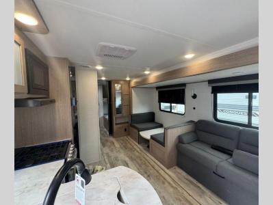 Living area extension slide with sofa and dinette to give extra space in new 2026 Gulf Stream Conquest Ultra Lite 279BH RV