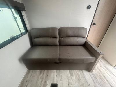 Sofa converts to a bed in new 2026 Gulf Stream Conquest Ultra Lite 26BHG RV