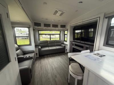 Spacious living area in new 2026 East to West Ahara 383UR fifth wheel