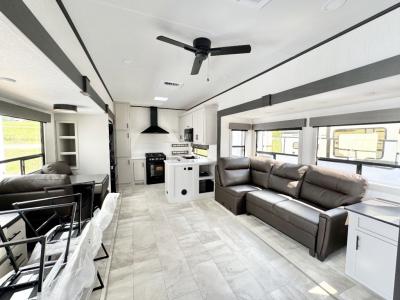 Spacious living area of new 2026 Prime Time Sanibel 38LAUNDRY RV