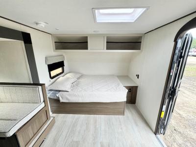 Master sleeping area and storage in new 2026 Prime Time Avenger LT 17BHS RV