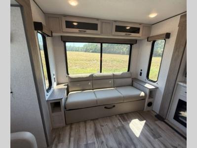 3 seat sleeper sofa in living area of new 2025 CrossRoads Zinger 340LR RV