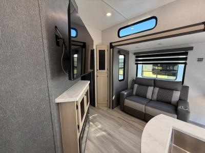Living area with theater seating in new 2026 Forest River Cardinal 37BEST RV