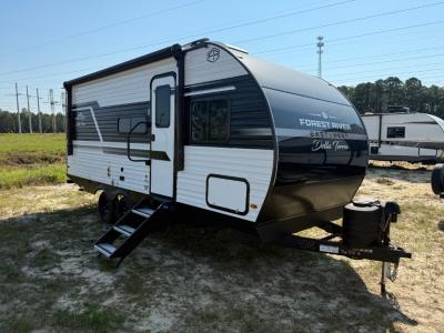 New East to West Della Terra 191BH travel trailer with 14' awning