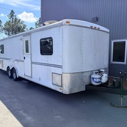 Exterior view of utility trailer conversion to a toy hauler; used 2003 RMST CT travel trailer