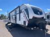 Passenger side with 2 glass entry doors, solid steps, and 18' power awning