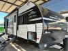 Passenger side view with 16' power awning and outside speakers
