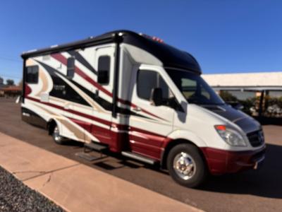 View of the Navion with slides in and 16' power awning