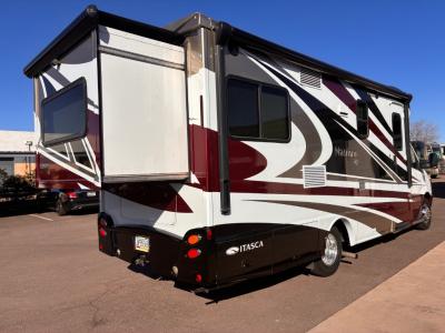 Rear view of Navion with rear bedroom slide out
