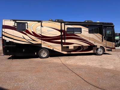 Passenger side with 2 slides, awning toppers, 17' power awning