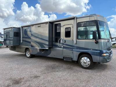 Winnebago 35A P/S with two slide outs and 21' power awning