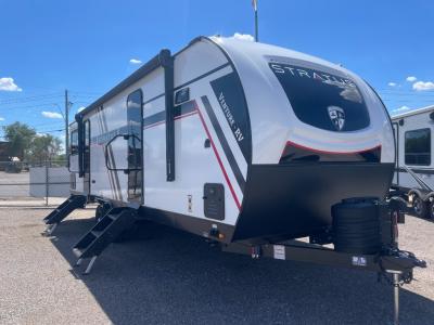 Passenger side with 2 glass entry doors, solid steps, and 18' power awning