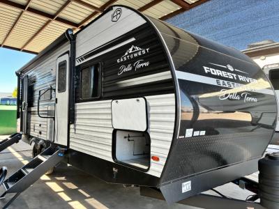 Passenger side view with 16' power awning and outside speakers