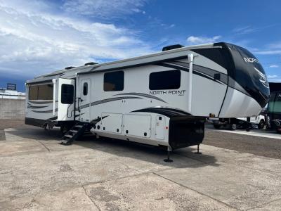 Driver's side view of North Point 377RLBH  with 18' power awning