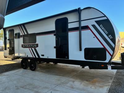 Side view with double entry doors and 18' power awning