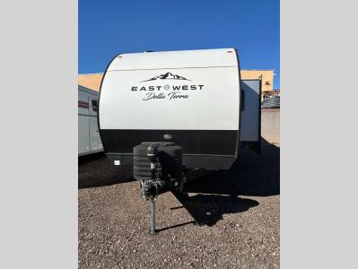 Front fiberglass cap with propane tanks and hitch