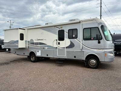 Passenger side with 16' power awning and bedroom slide out