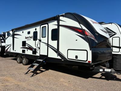 View of the passenger side with 18' power awning